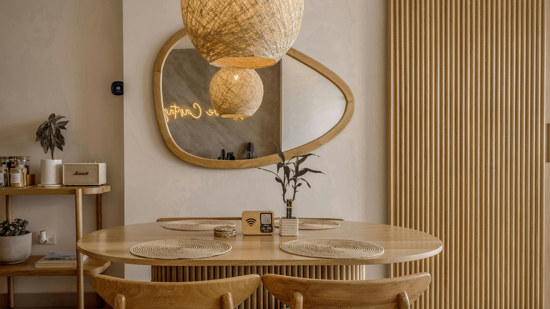 Property dining area with a mirror, symbolizing modern hospitality enhanced by Jurny’s AI-powered PMS features for short-term rentals and hotels in 2025.