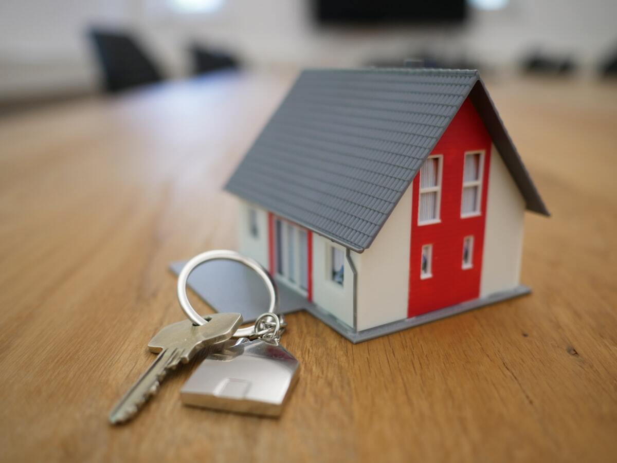 Property manager reviewing Airbnb listing titles across a portfolio of 15+ vacation rental properties using Jurny AI